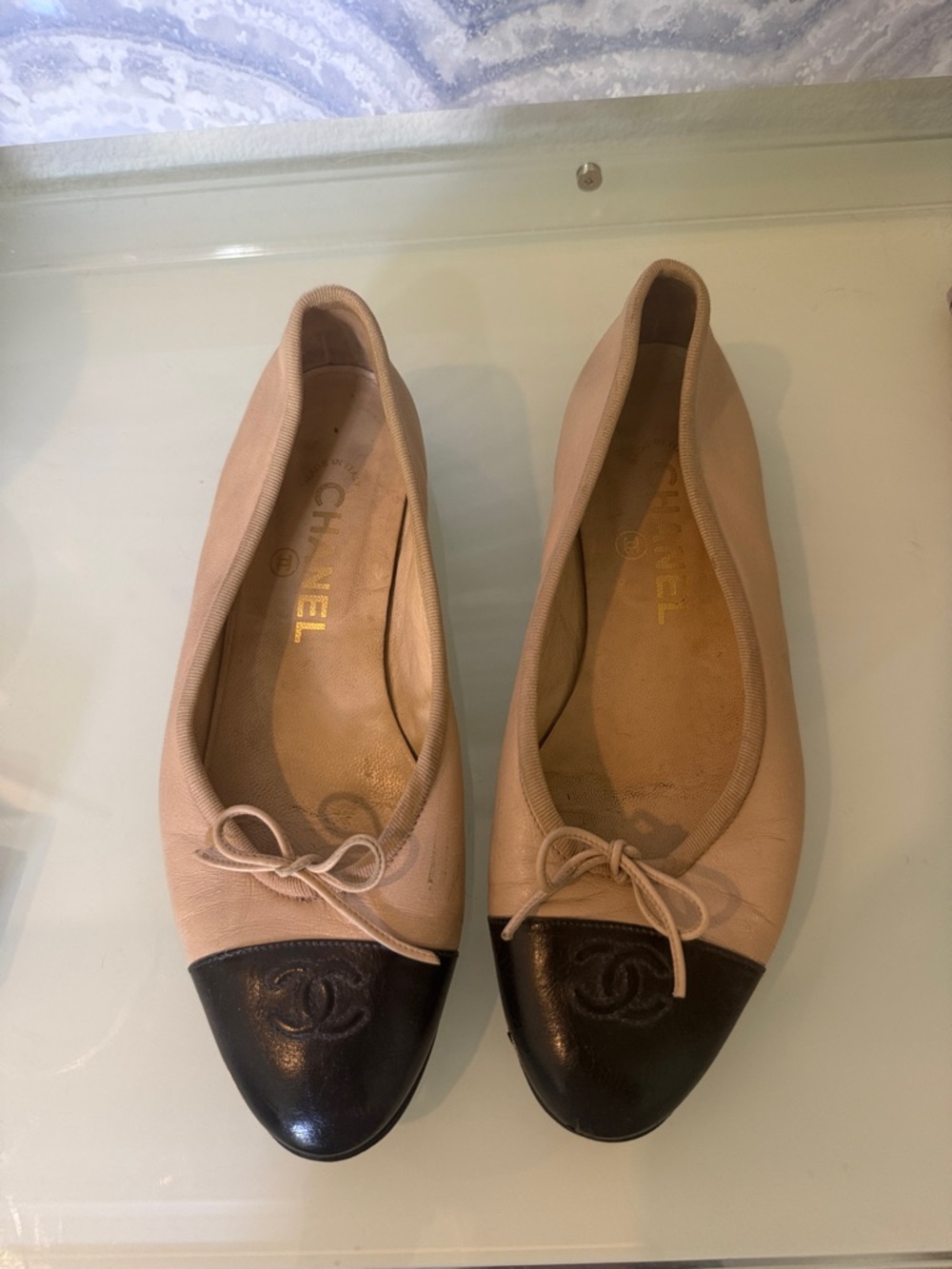 CHANEL Two-Tone Cap-Toe Ballet Flats in Beige and Black